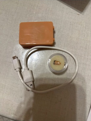 Miniature covert earbud headset