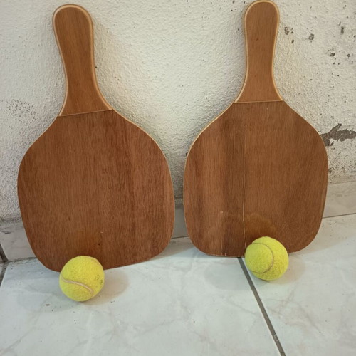 Wooden beach paddles like new, height 40cm width 23cm