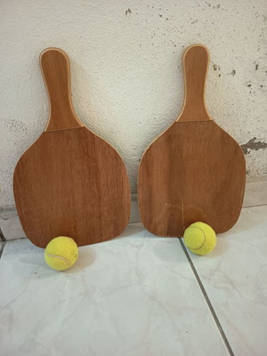 Wooden beach paddles like new, height 40cm width 23cm