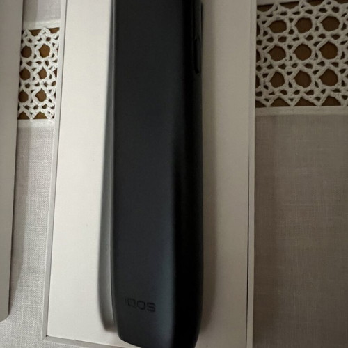 IQOS ILUMA i ONE device, dark blue