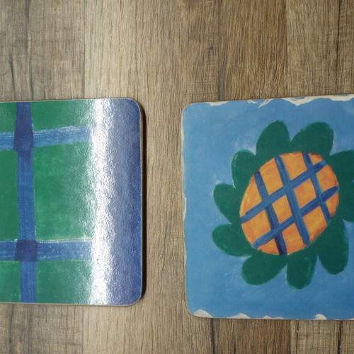 Coasters like new, set of 6 with cork base