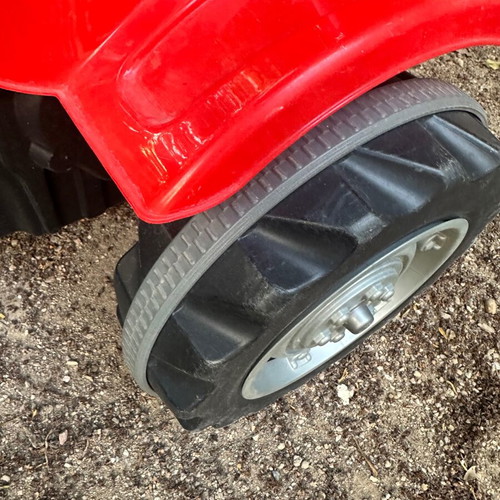 Small red pedal tractor for kids like new