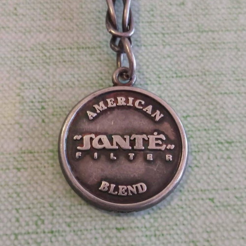 Santé Vintage Double-Sided Metal Keychain 1990s used