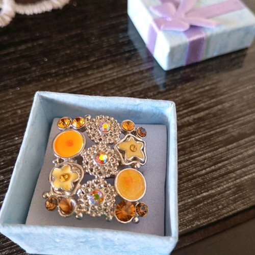 Adjustable ring like new, steel, yellow and orange