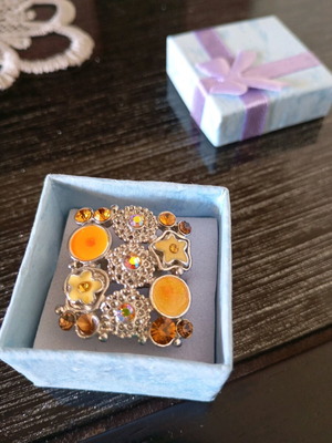 Adjustable ring like new, steel, yellow and orange