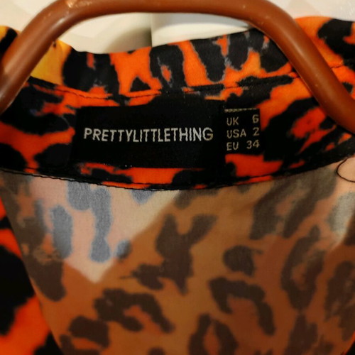 Pretty Little Thing shirt orange like new, size XS