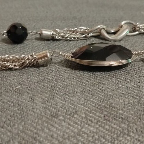 Long women's necklace with large black stones and silver chains like new