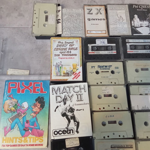 Collectible pack of 50 cassette videogame programs ZX Spectrum Commodore used, 1980s