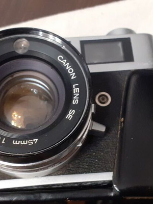 Canon Canonet QL19 camera used with flash and extra lens
