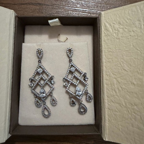 Women's earrings new silver unworn