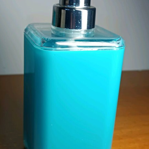 Soap dispenser and toothbrush holder used