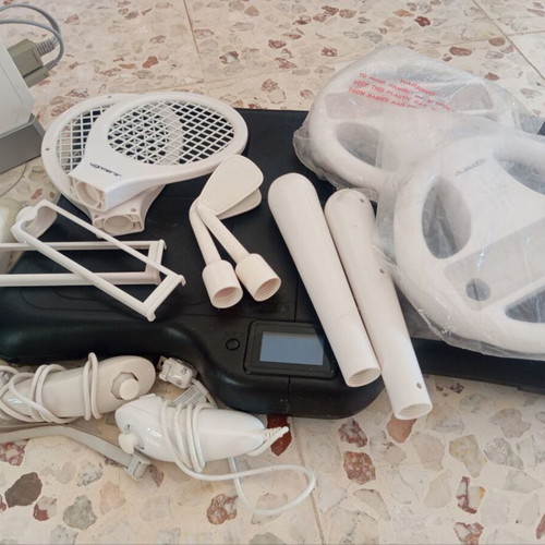 Nintendo Wii console used with controllers and accessories