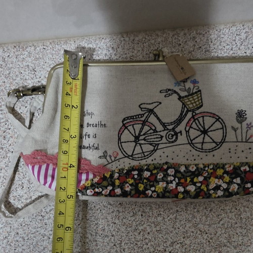 Canvas wrist bag with clip and 2 pockets like new, multicolor