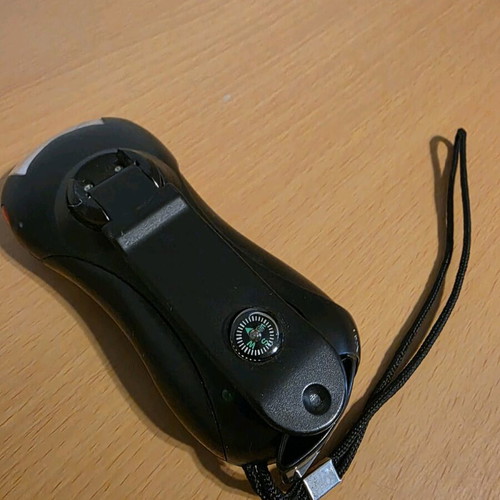 Flashlight with crank used with alarm