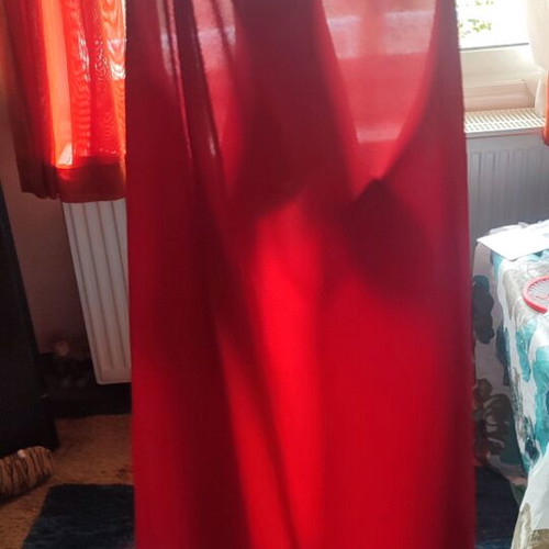 Red sleeveless flowing top used, size S, semi transparent material