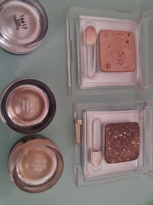 Tommy G eyeshadows and shimmer powders like new