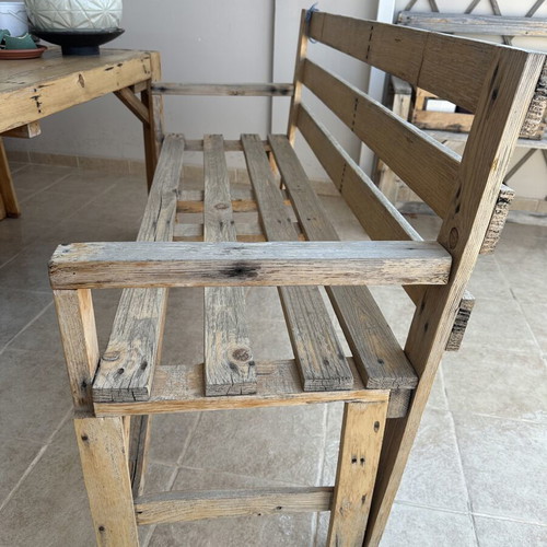 Handmade wooden table set with chairs and bench used
