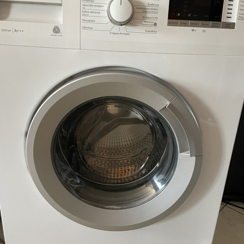 Washing machine like new, 7 kg load capacity