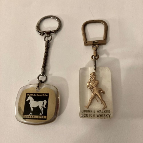 Keychains 2 collectible used Johnnie Walker and White Horse