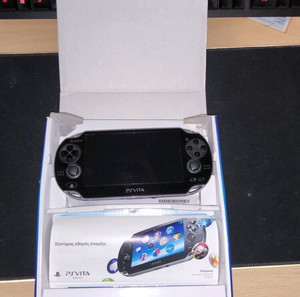 ps vita pch 1004 OLED μαζί με UNCHARTED GOLDEN ABYSS