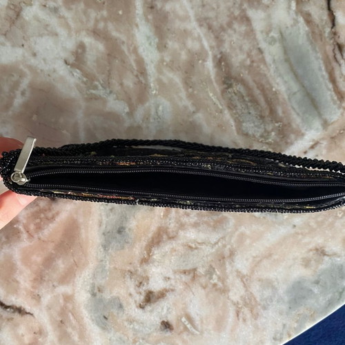 Vintage shoulder bag used with embroidered designs and beads