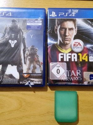 PS4 Destiny and FIFA14 game cases and empty PS1 memory card case used