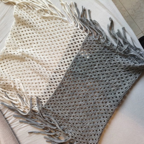 Knitted scarf used with boho style in gray and cream