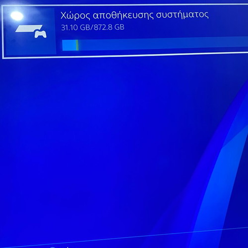 Sony PlayStation 4 Pro 1TB console with controller and cables