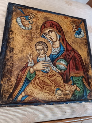 Cardboard box with silk-screened religious icon on canvas