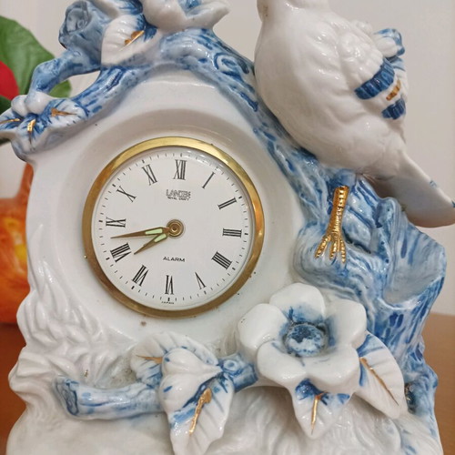 Porcelain table clock like new with romantic bird design