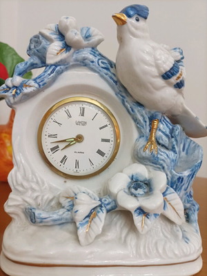 Porcelain table clock like new with romantic bird design