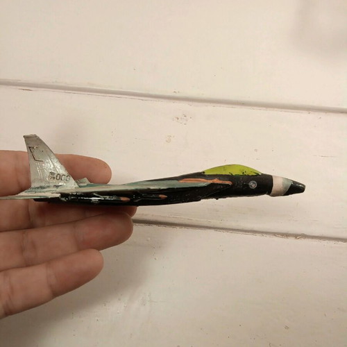 Model airplane used, hand-painted plastic