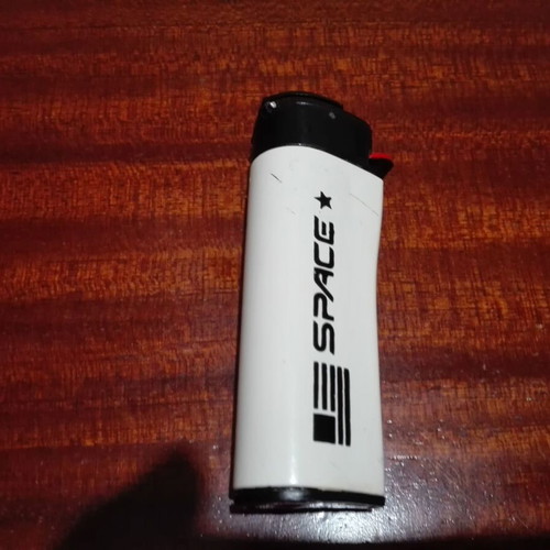 Vintage prank lighter used Greek made Ouzounis 80s
