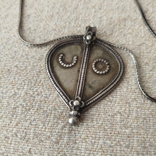 Vintage necklace with 925 silver chain and large ethnic pendant used