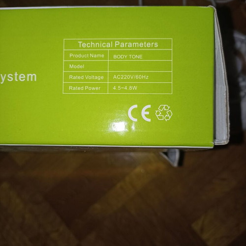 Body Tone massage machine like new with charger and cable