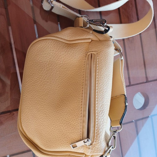 Yellow crossbody belt bag with adjustable strap