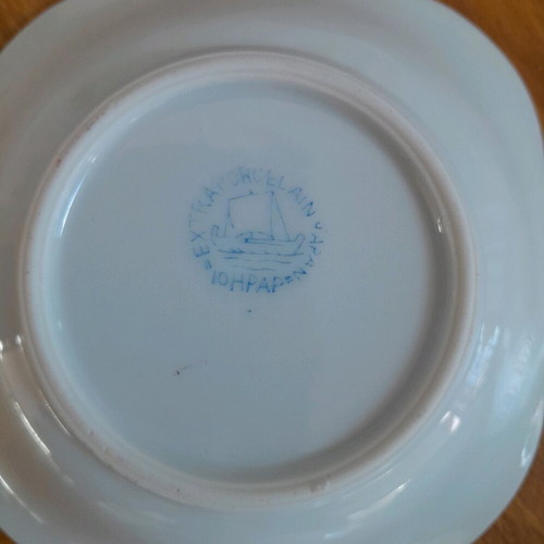 Porcelain plates and miniature bowls, old unused