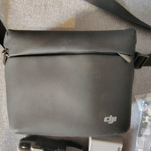 DJI Mini 2 equipment like new with RC231 controller and spare parts