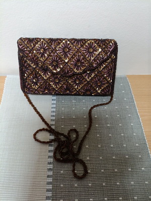Women's shoulder bag like new, brown fabric with pattern