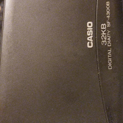 Collection of 6 handheld calculators including Casio, Sharp, and guitar tuner
