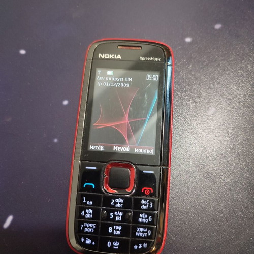 Nokia XpressMusic τηλέφωνο μεταχειρισμένο, σπασμένο τζαμάκι κάμερας, με φορτιστή
