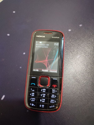 Nokia XpressMusic τηλέφωνο μεταχειρισμένο, σπασμένο τζαμάκι κάμερας, με φορτιστή