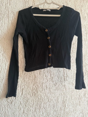 Blouse with long sleeves and decorative buttons, lightly used