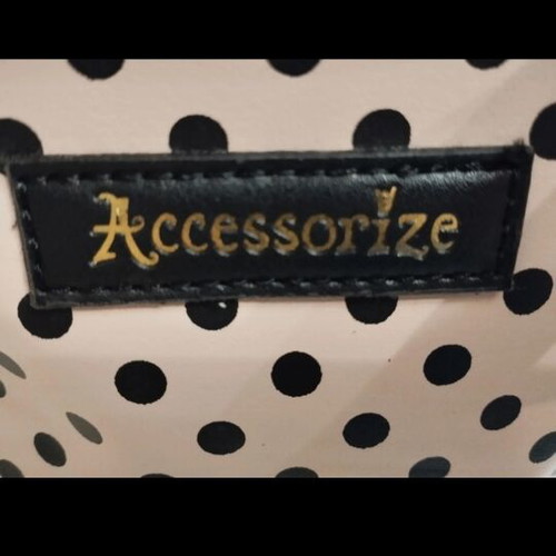 Accessories backpack large size like new with pink and black polka dot design