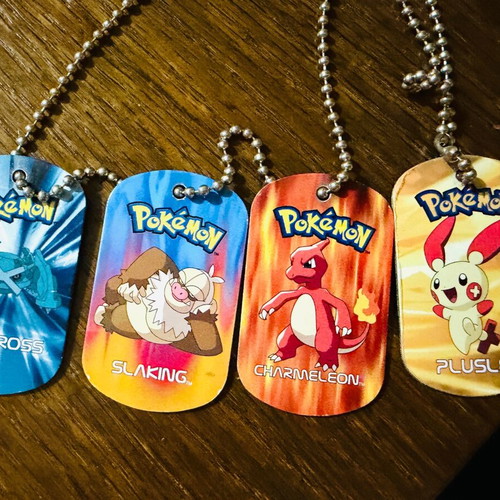 Pokemon 2006 metal tags set used