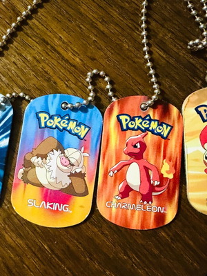 Pokemon 2006 metal tags set used