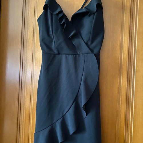 Black dress used with gold zipper on back