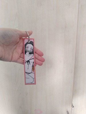 Nezuko anime keychain like new, multicolored