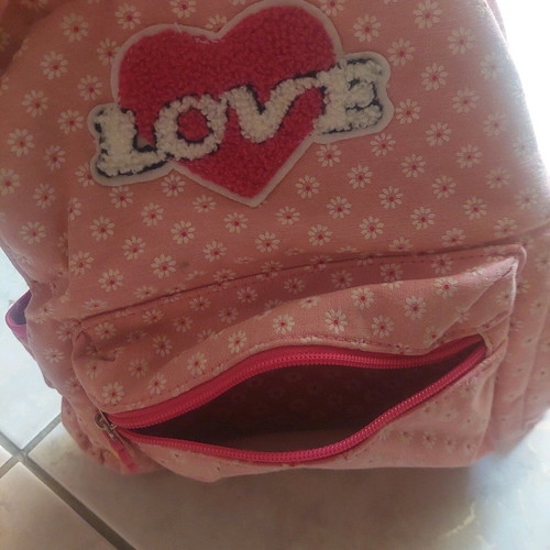Pink children's backpack with flowers like new