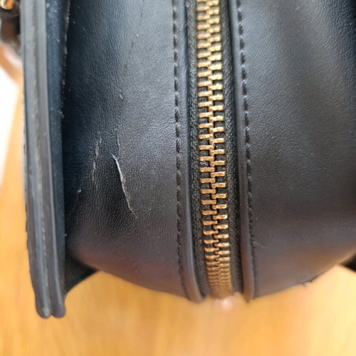 Love Moschino black hand bag like new with charms